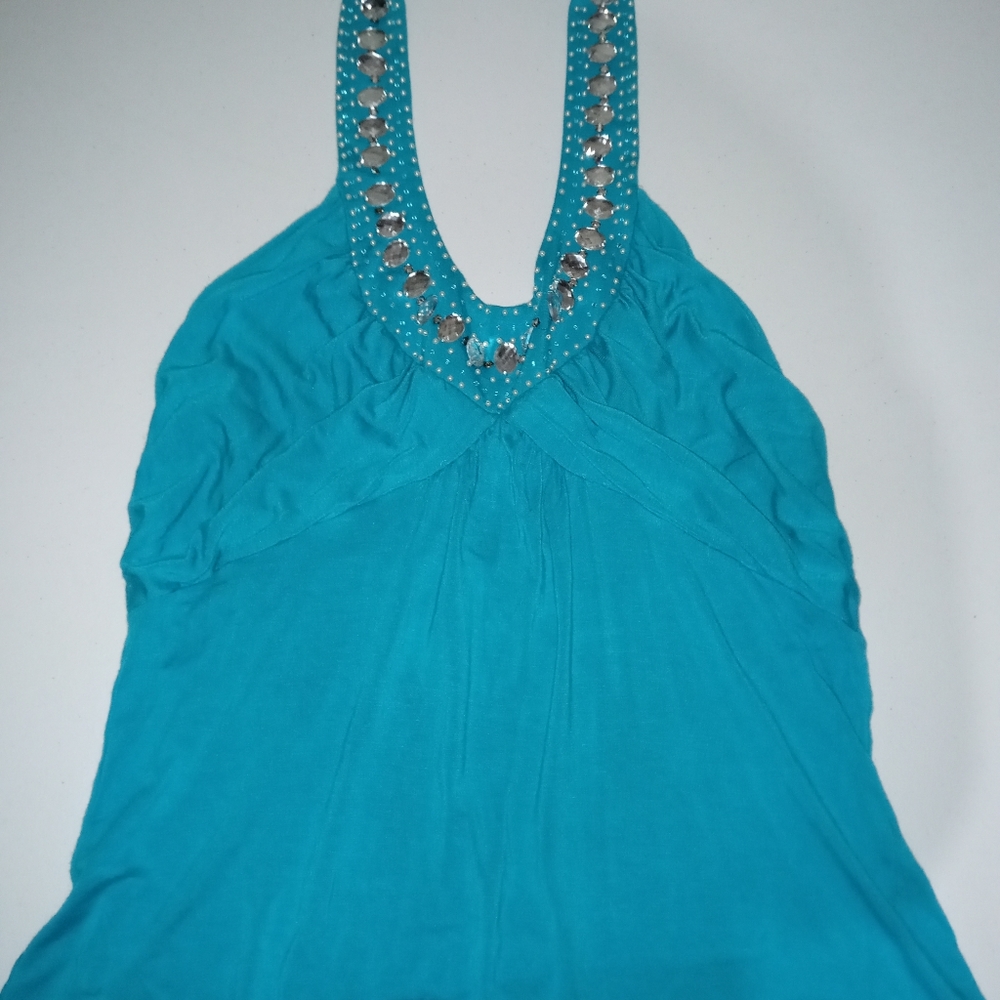 Blue shirt goes around your neck with stones size large